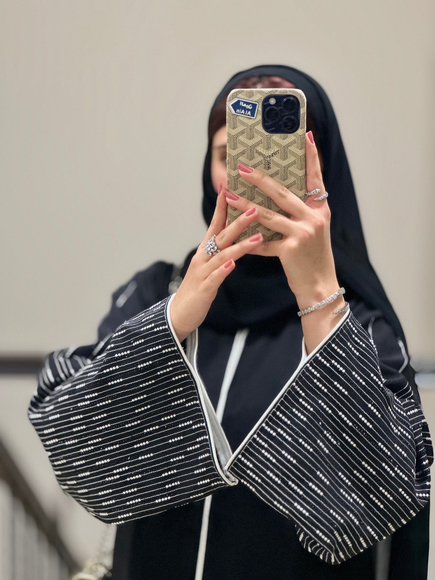 Black and white embroidery and stone work abaya