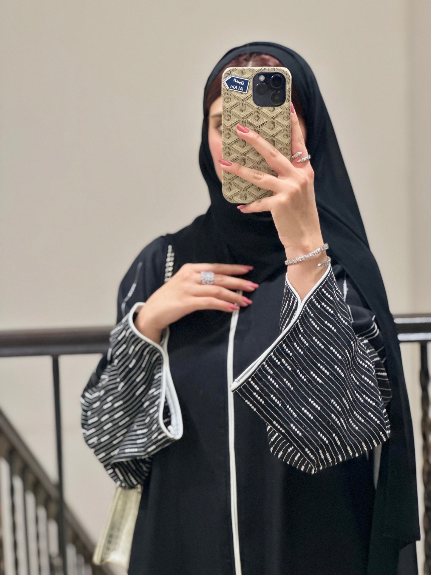 Black and white embroidery and stone work abaya